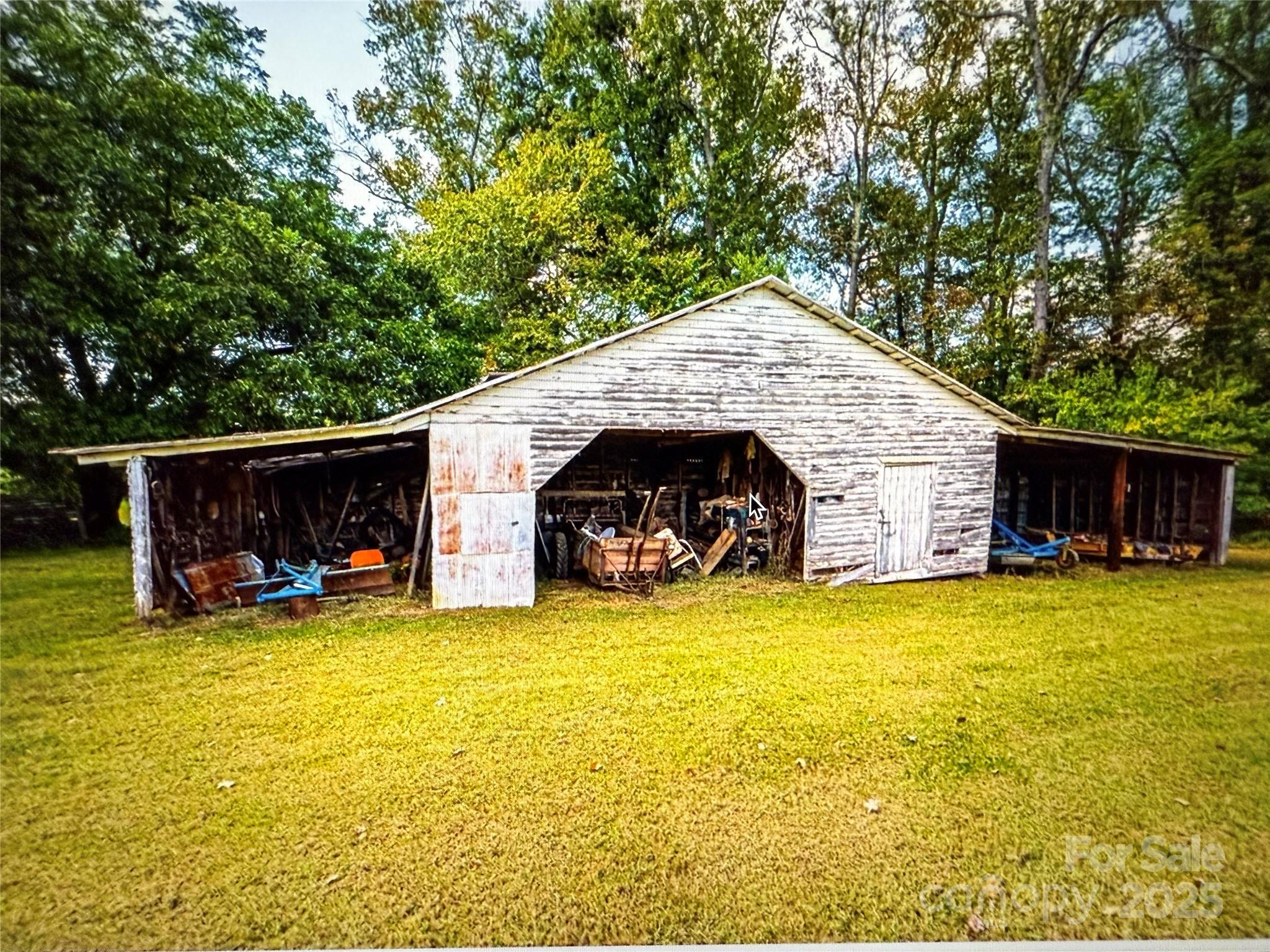 1170 Gold Knob Road Salisbury, NC 28146 - Photo 29 of 34 a view of a house with swimming pool and sitting area