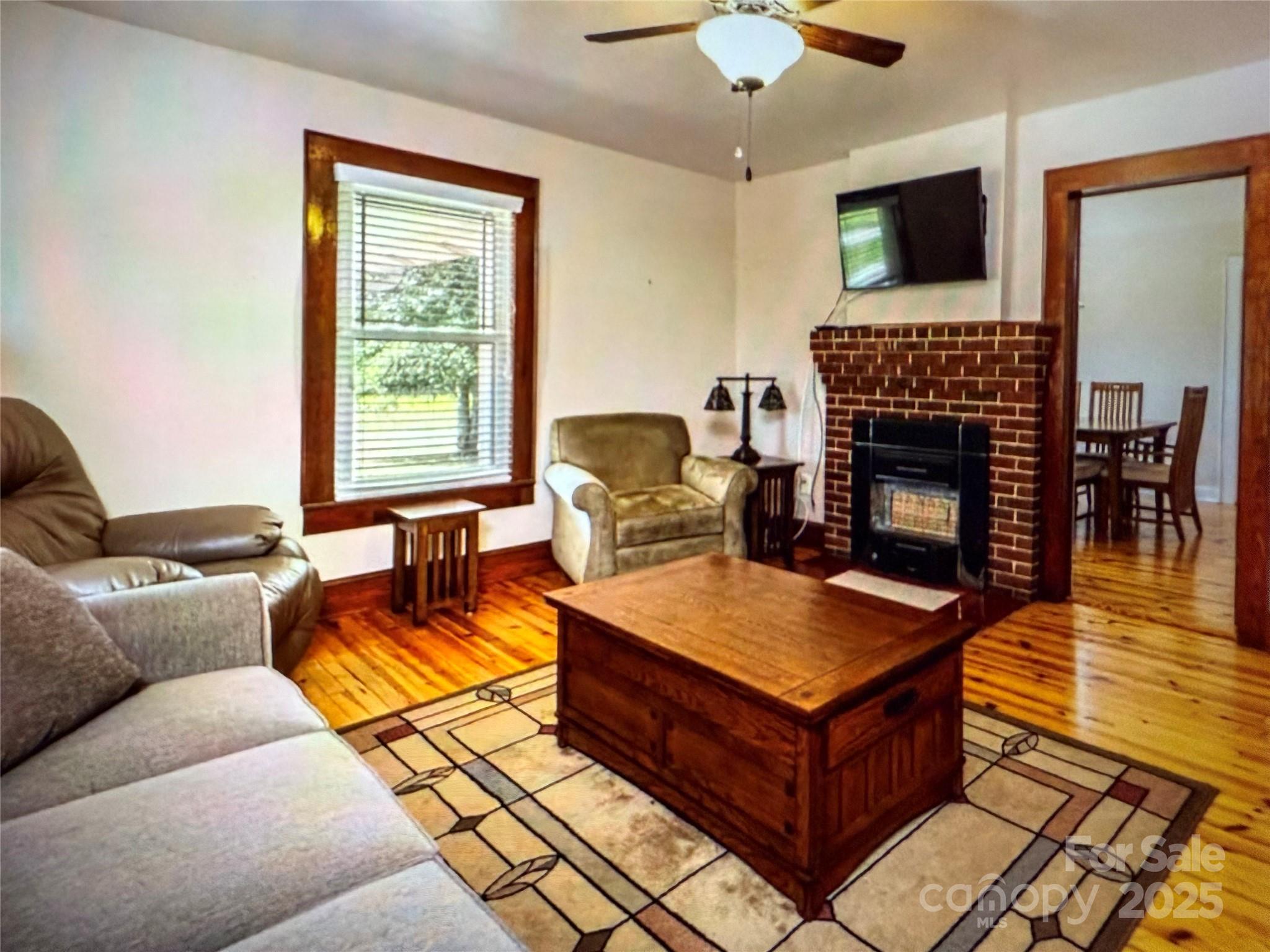 1170 Gold Knob Road Salisbury, NC 28146 - Photo 9 of 34 a living room with furniture and a fireplace