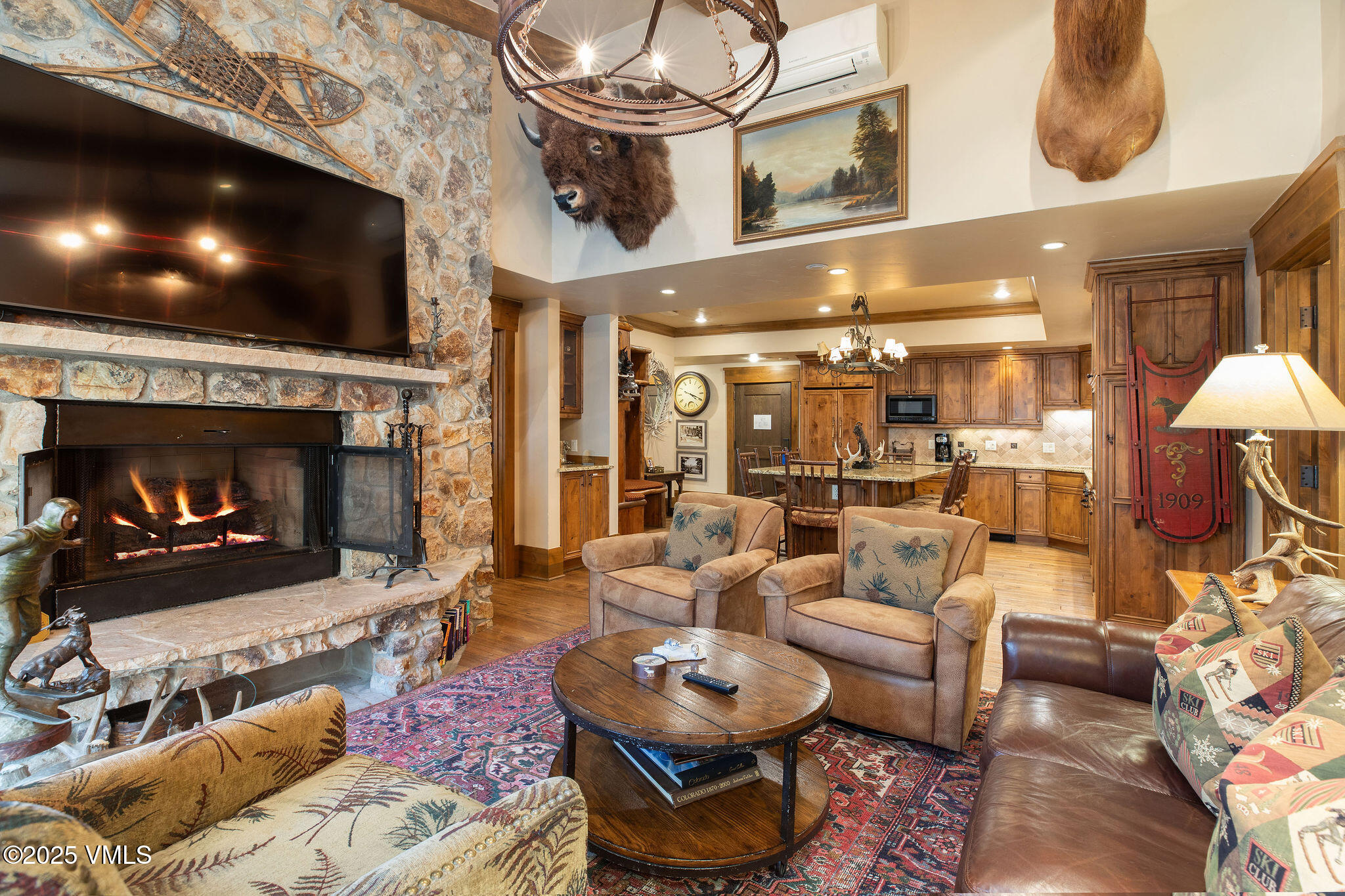 120 Offerson Road, Unit 7410/15 Beaver Creek, CO 81620 - Photo 2 of 15 a living room with furniture and a flat screen tv