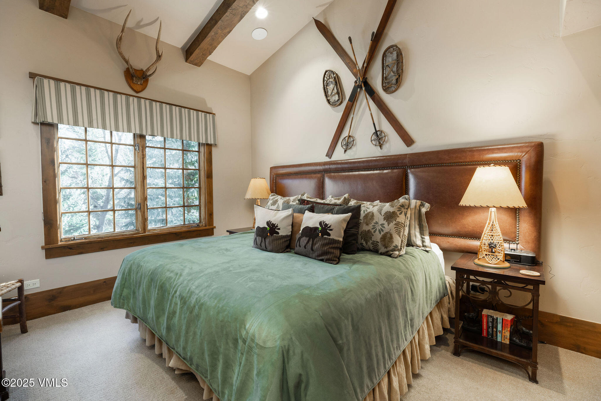 120 Offerson Road, Unit 7410/15 Beaver Creek, CO 81620 - Photo 9 of 15 a bed room with a bed and a window