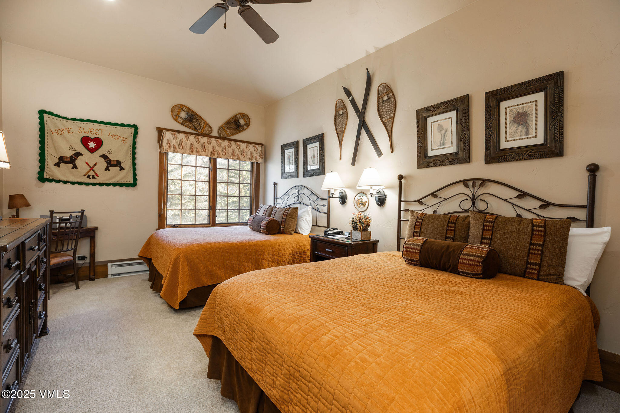 120 Offerson Road, Unit 7410/15 Beaver Creek, CO 81620 - Photo 10 of 15 a bedroom with two beds and painting on the wall