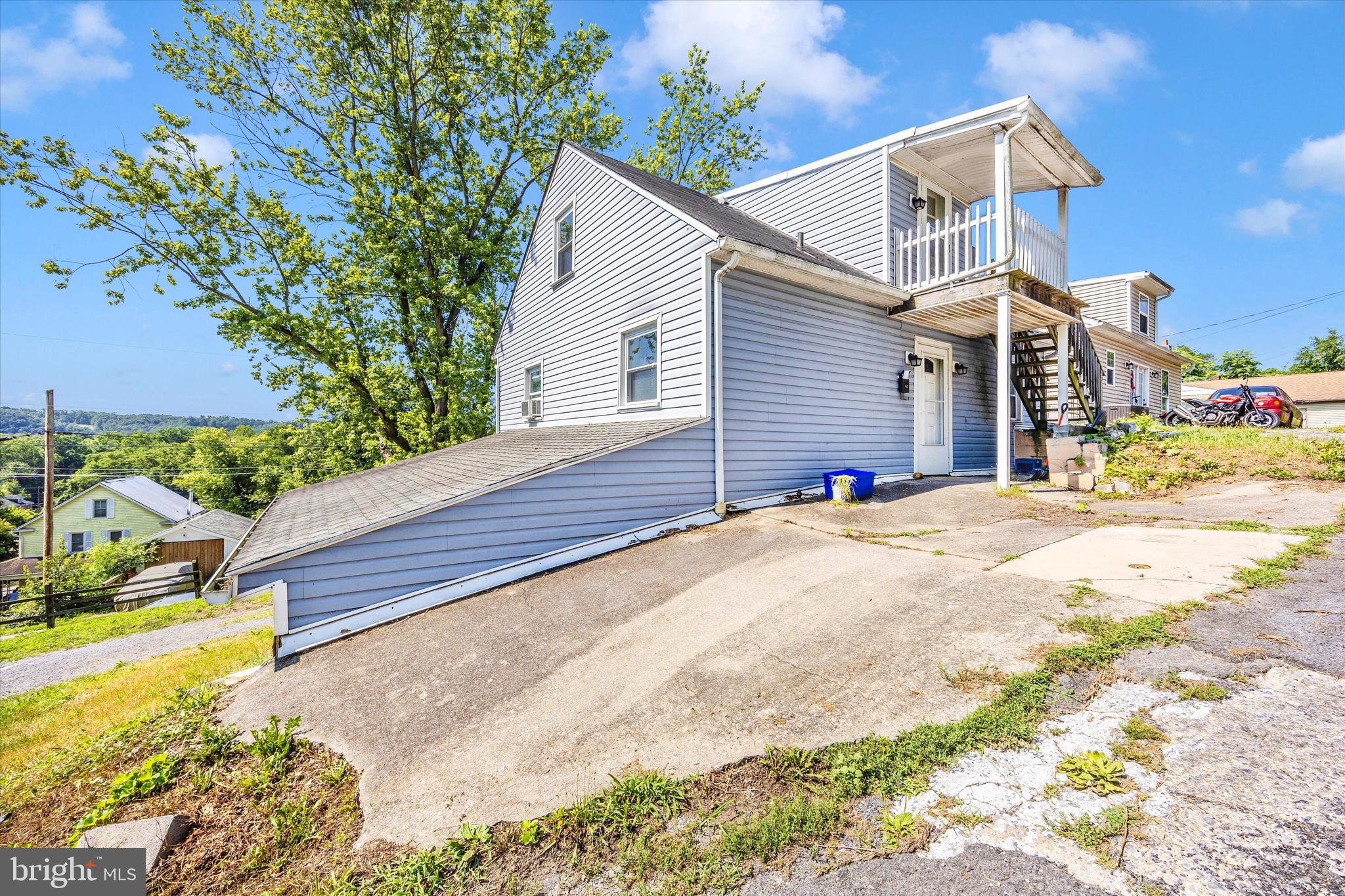 214 Jackson Street Hancock, MD 21750 - Photo 27 of 40 a view of a house with a yard
