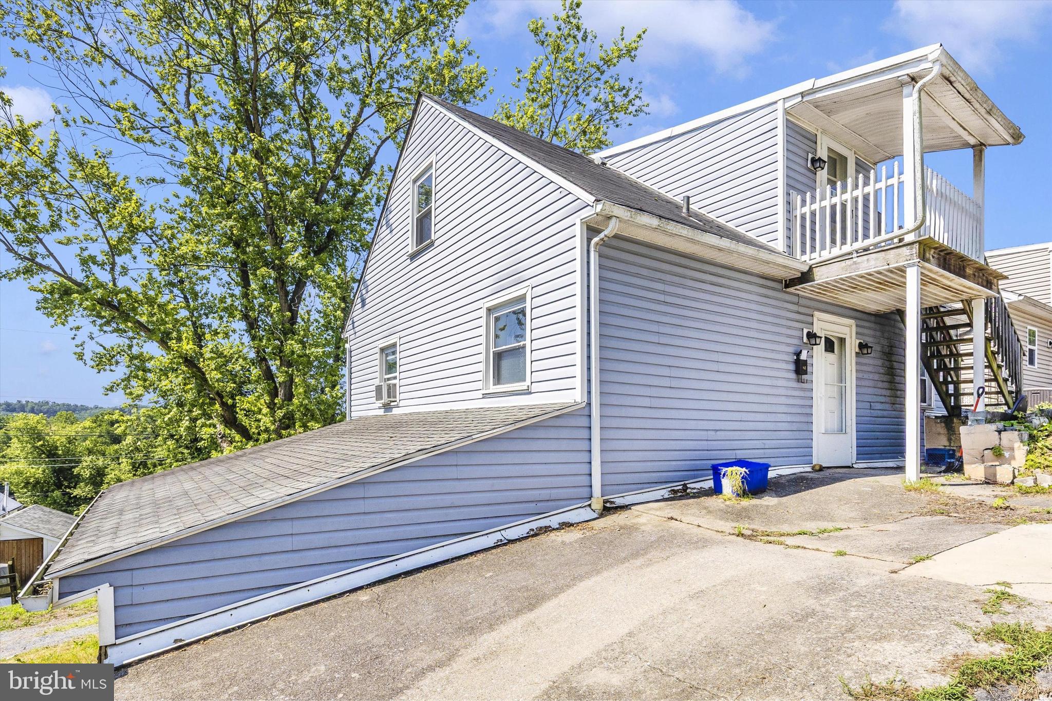 214 Jackson Street Hancock, MD 21750 - Photo 38 of 40 a view of a house with a yard and tree s