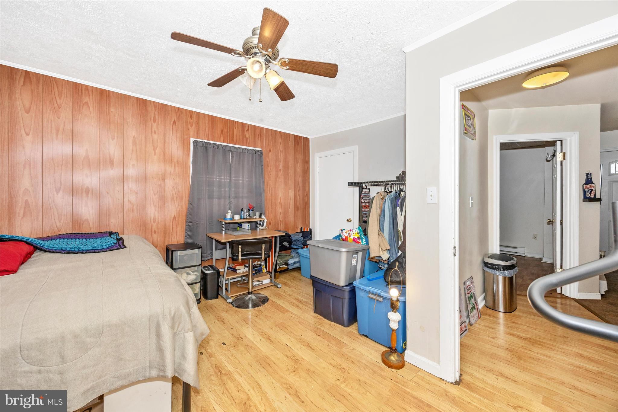 214 Jackson Street Hancock, MD 21750 - Photo 7 of 40 a bed room with a bed and a chair