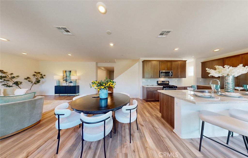 24320 Insignia Drive Menifee, CA 92584 - Photo 17 of 65 Kitchen and dining combo