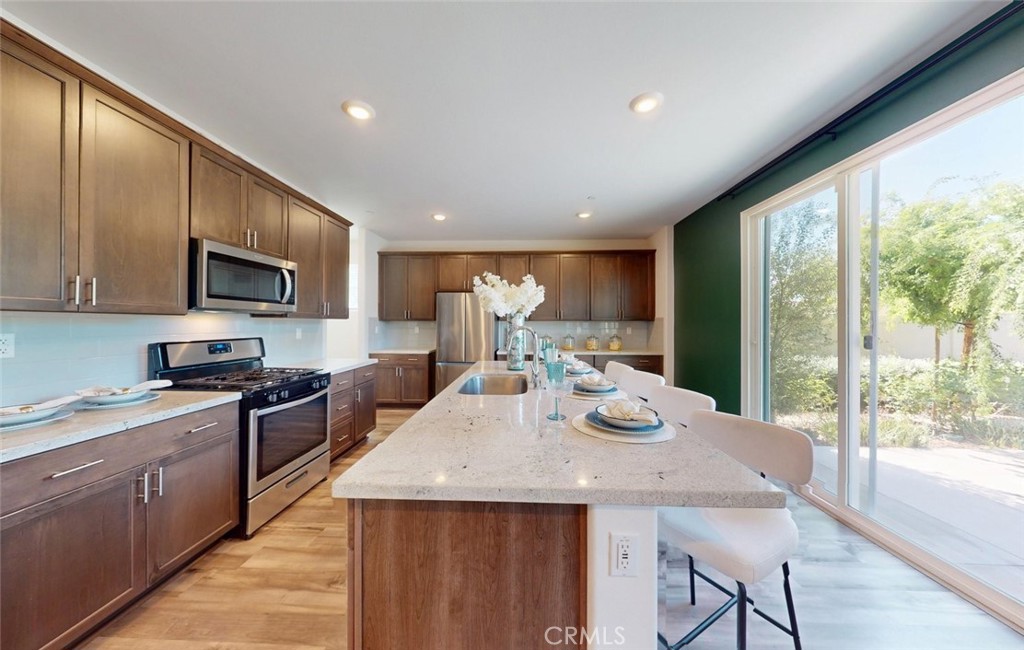 24320 Insignia Drive Menifee, CA 92584 - Photo 18 of 65 Modern kitchen with island