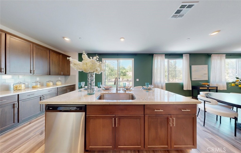 24320 Insignia Drive Menifee, CA 92584 - Photo 19 of 65 Open kitchen with ample cabinetry