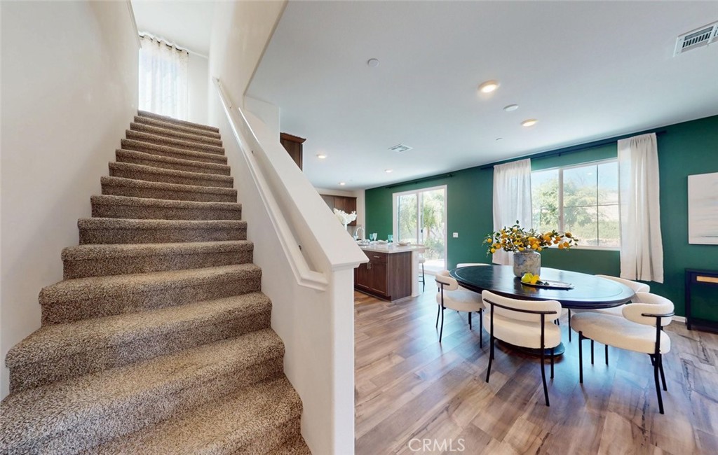 24320 Insignia Drive Menifee, CA 92584 - Photo 26 of 65 Bright living area with backyard view