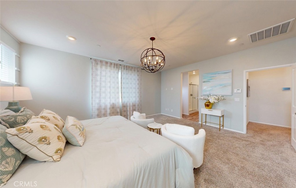 24320 Insignia Drive Menifee, CA 92584 - Photo 43 of 65 Comfortable bedroom with soft lighting