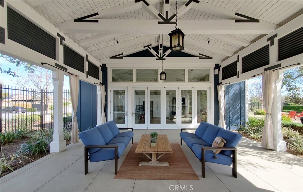 24320 Insignia Drive Menifee, CA 92584 - Photo 61 of 65 a view of a patio with a table and chairs