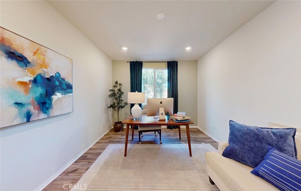 24320 Insignia Drive Menifee, CA 92584 - Photo 9 of 65 a workspace with furniture and window