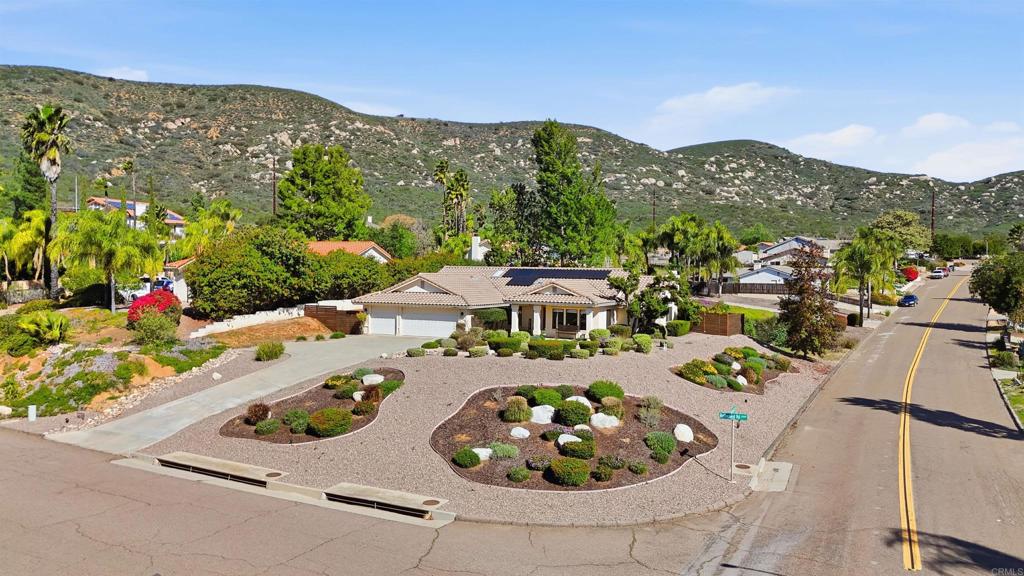 24586 Rutherford Road Ramona, CA 92065 - Photo 29 of 33 a view of a patio with a table and chairs and potted plants