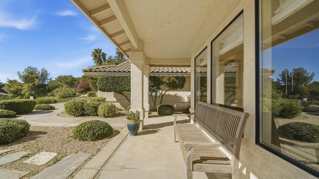 24586 Rutherford Road Ramona, CA 92065 - Photo 3 of 33 a view of living room with furniture and floor to ceiling window