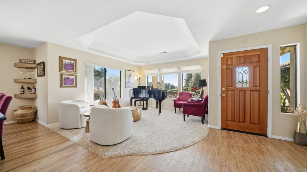 24586 Rutherford Road Ramona, CA 92065 - Photo 6 of 33 a living room with furniture and wooden floor
