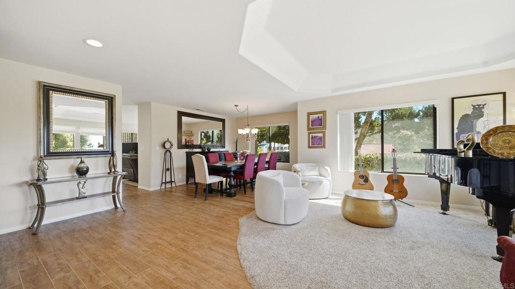 24586 Rutherford Road Ramona, CA 92065 - Photo 7 of 33 a living room with furniture and a fireplace