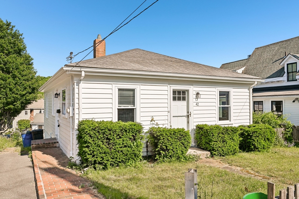 42 East Main Street Gloucester, MA 01930 - Photo 12 of 25 a view of a house with a yard