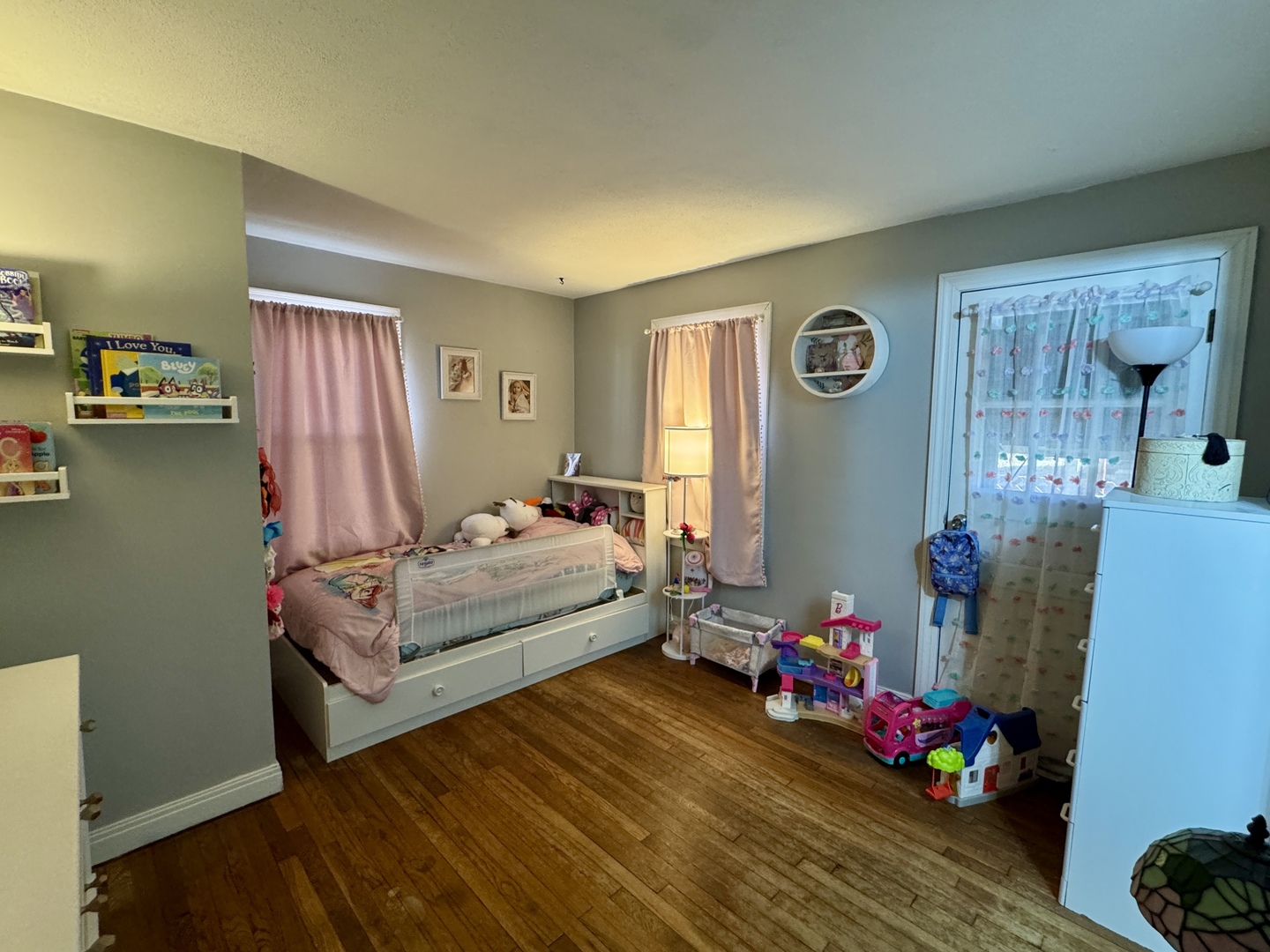 216 South Main Street Sheffield, IL 61361 - Photo 15 of 28 a bedroom with bed and wooden floor