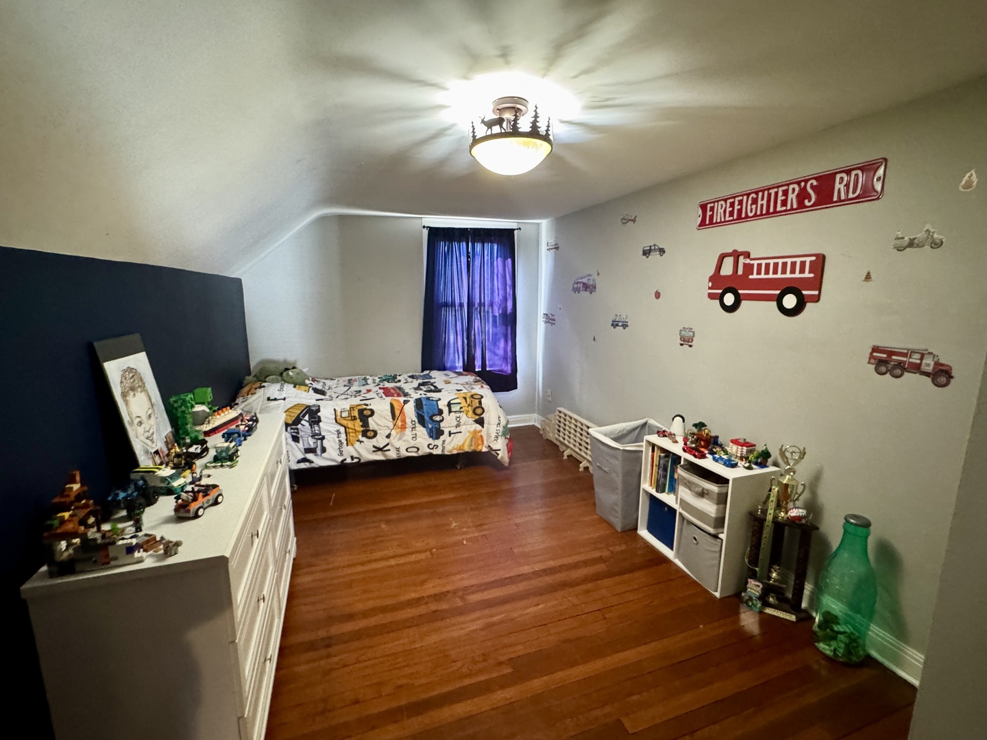 216 South Main Street Sheffield, IL 61361 - Photo 22 of 28 a bed room with a bed furniture and a flat screen tv