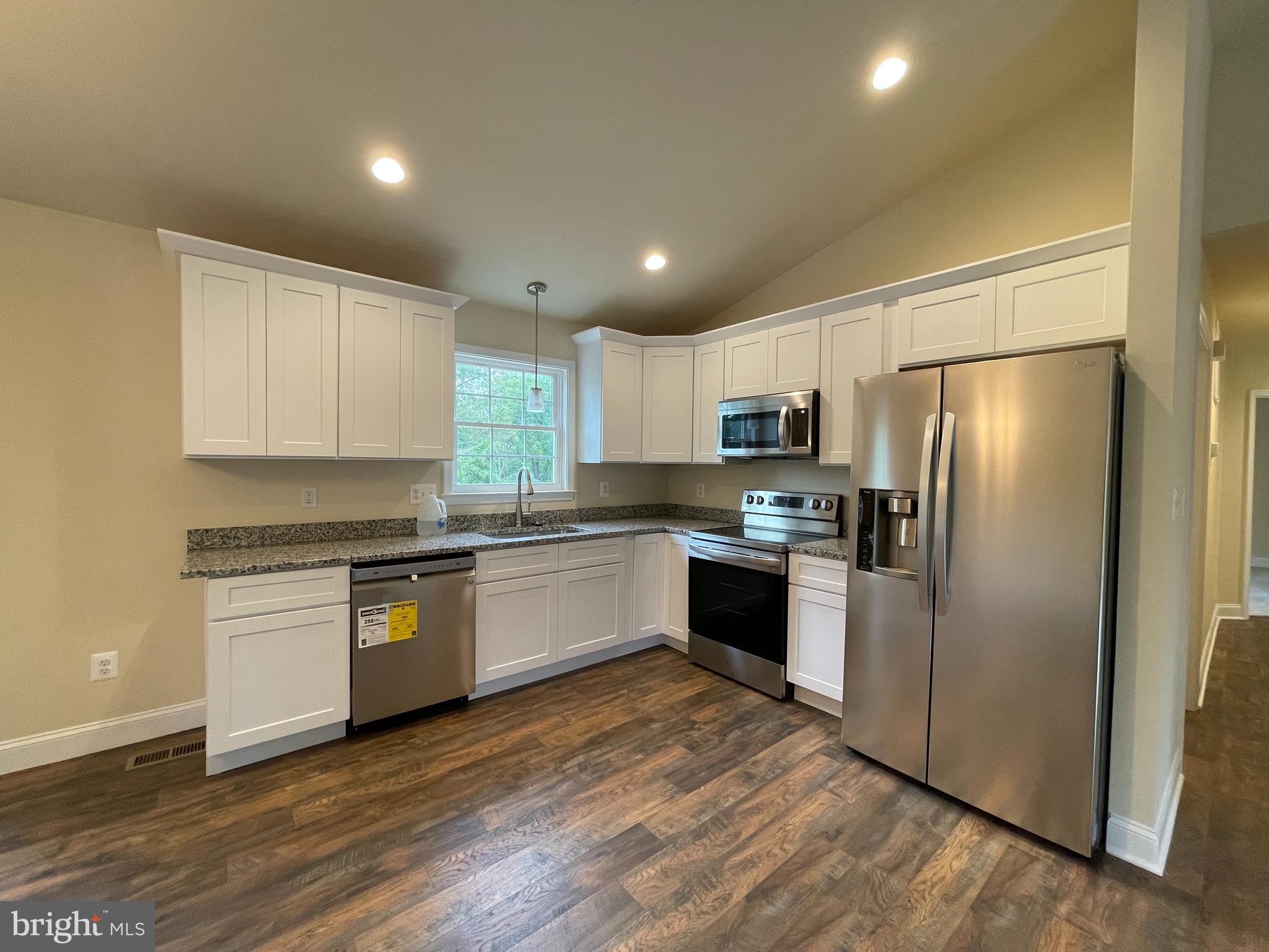 8112 Leland Road Manassas, VA 20111 - Photo 5 of 24 Check out this stellar kitchen w/ SS and Granite!