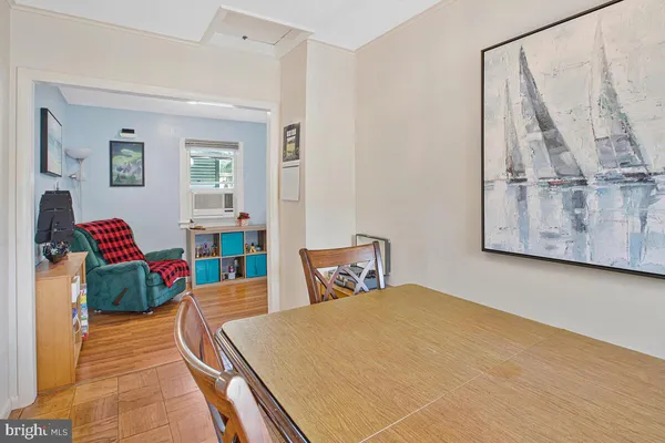 a view of a white house with a yard