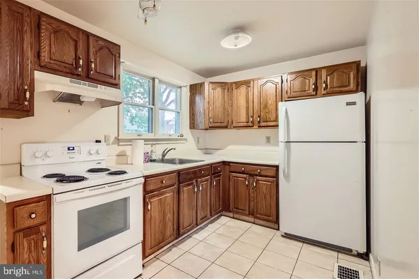a view of room with rug and window