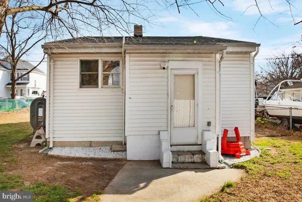 a house view with a backyard space