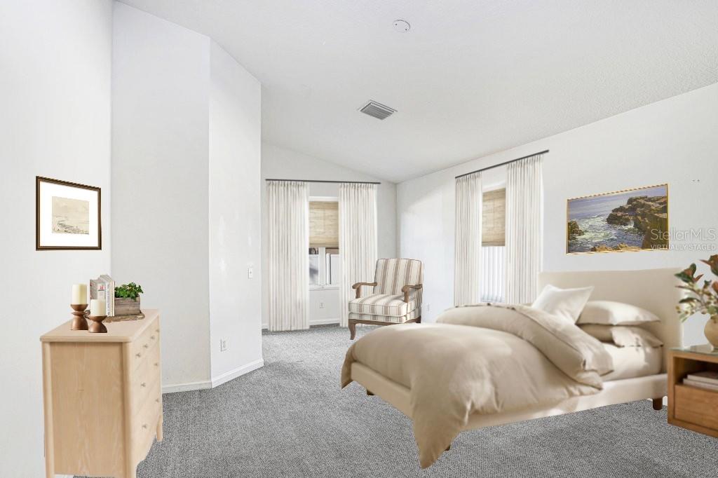 2412 Durant Road Valrico, FL 33594 - Photo 11 of 26 a bedroom with a bed and wooden floor