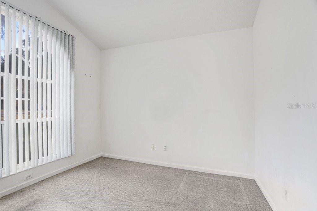 2412 Durant Road Valrico, FL 33594 - Photo 16 of 26 a view of an empty room with a window
