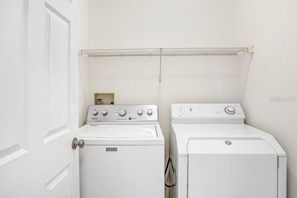 2412 Durant Road Valrico, FL 33594 - Photo 20 of 26 a utility room with dryer and washer