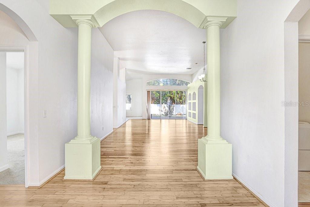 2412 Durant Road Valrico, FL 33594 - Photo 2 of 26 a view of an entryway with wooden floor