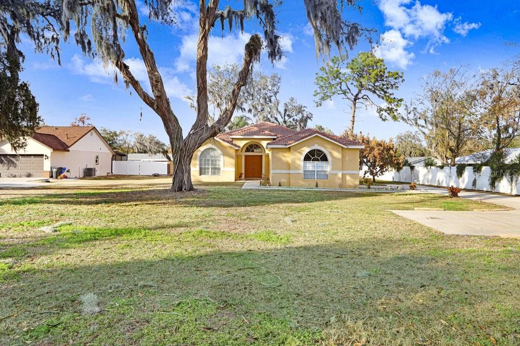 2412 Durant Road Valrico, FL 33594 - Photo 26 of 26 a house view with swimming pool in front of house
