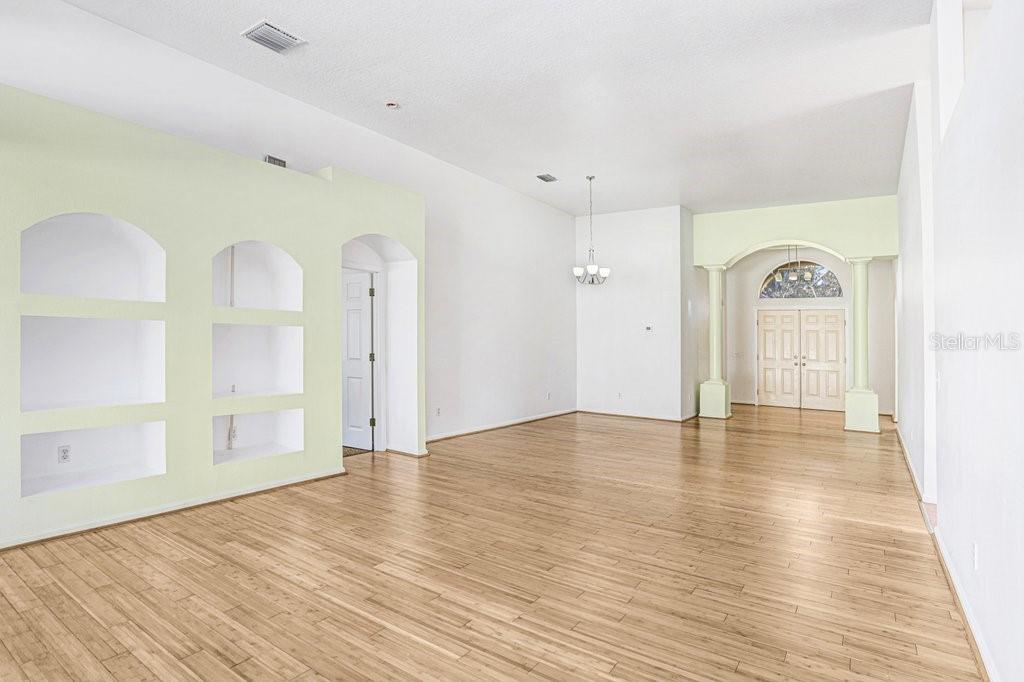 2412 Durant Road Valrico, FL 33594 - Photo 4 of 26 a view of a room with wooden floor and window