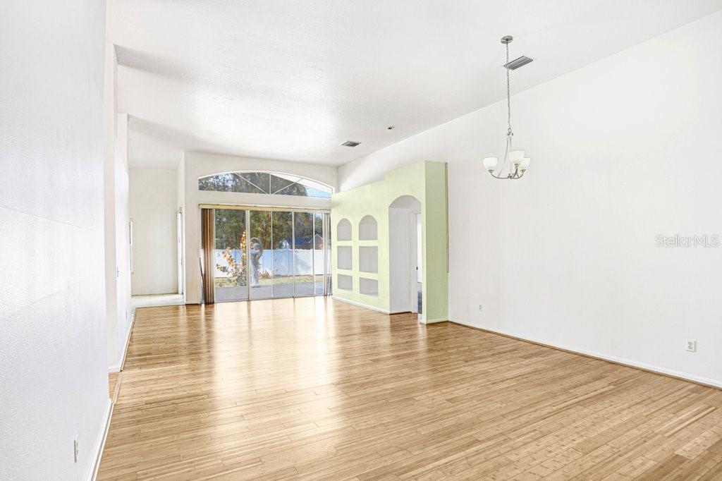 2412 Durant Road Valrico, FL 33594 - Photo 5 of 26 a view of an entryway with wooden floor