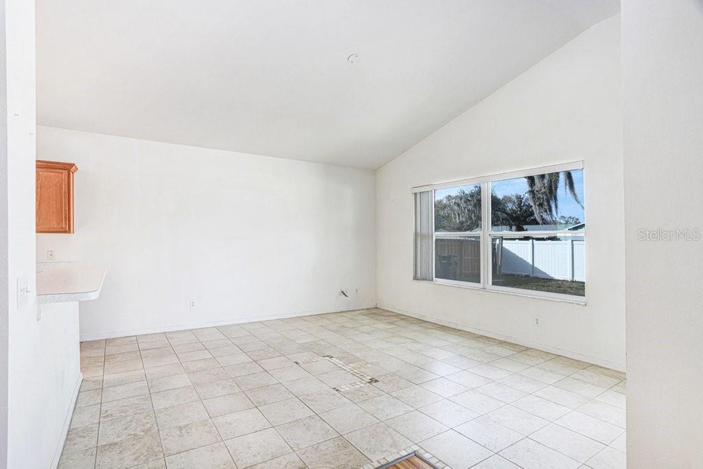 2412 Durant Road Valrico, FL 33594 - Photo 10 of 26 an empty room with windows