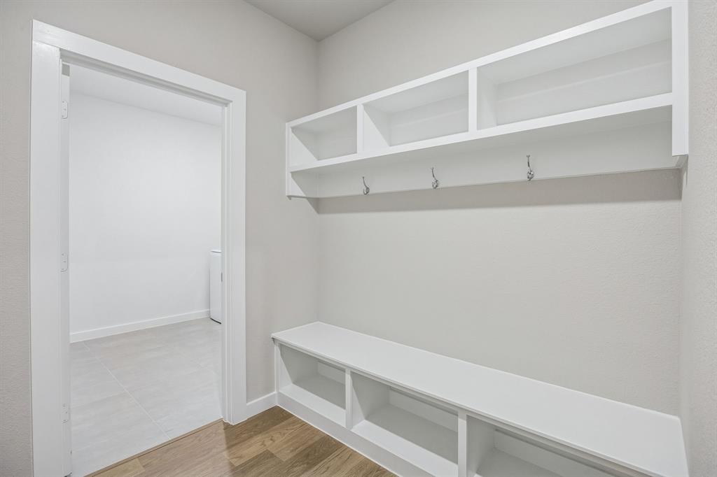 1404 Companero Street Haslet, TX 76052 - Photo 34 of 40 Utility Room in the Wimbledon home plan by Trophy Signature Homes – REPRESENTATIVE PHOTO