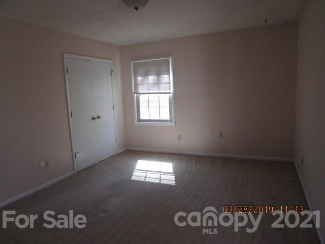 6800 Stoney Ridge Road Matthews, NC 28104 - Photo 13 of 15 a view of an empty room with windows