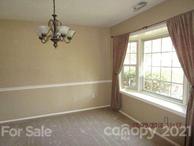 6800 Stoney Ridge Road Matthews, NC 28104 - Photo 10 of 15 a view of an empty room with a window