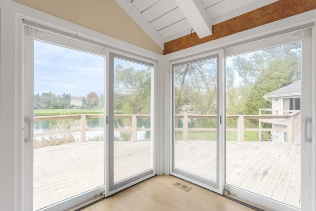 a view of an empty room and window