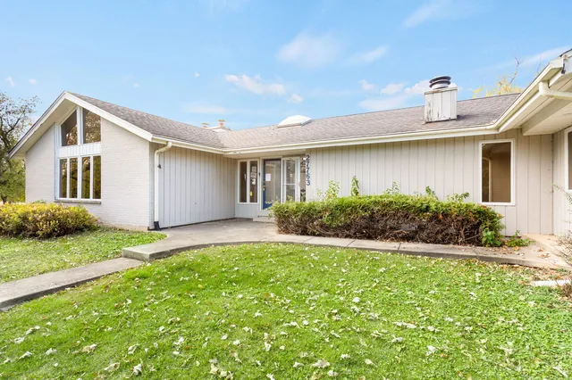 a house view with a garden space