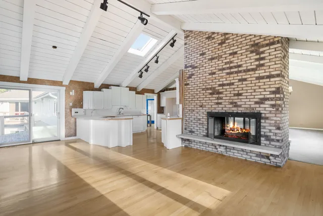 a living room with a fireplace