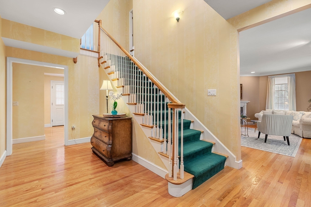 3 Stone Road Boxford, MA 01921 - Photo 15 of 40 a view of entryway and hall with wooden floor