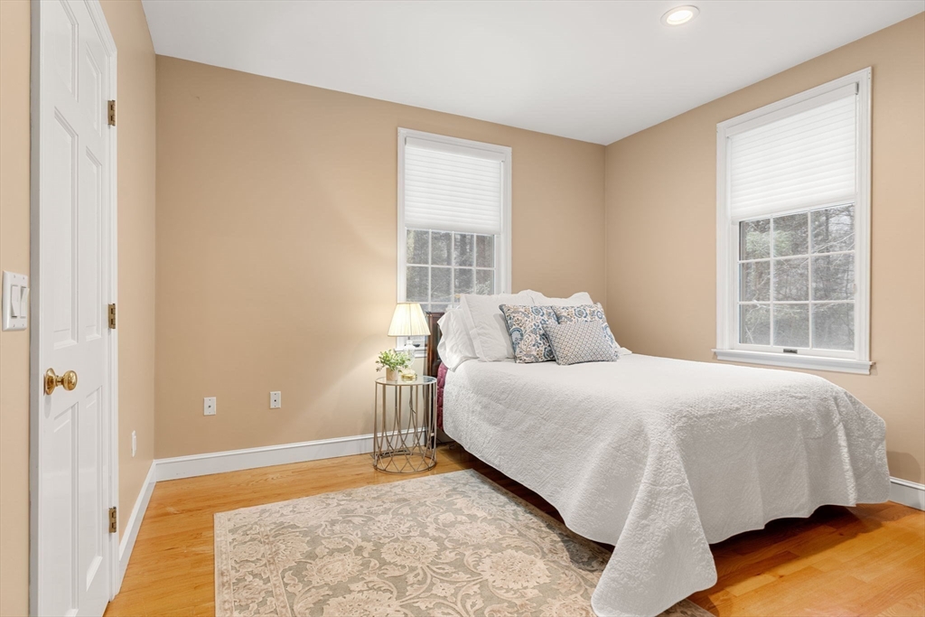 3 Stone Road Boxford, MA 01921 - Photo 18 of 40 a bedroom with a bed and a window