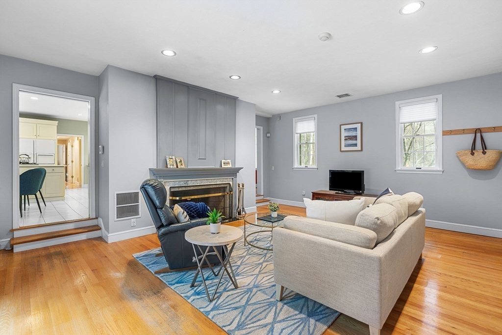 3 Stone Road Boxford, MA 01921 - Photo 4 of 40 a living room with furniture and a fireplace