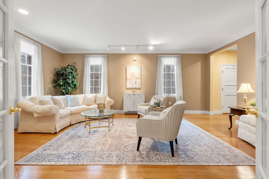 3 Stone Road Boxford, MA 01921 - Photo 7 of 40 a living room with furniture and a large window