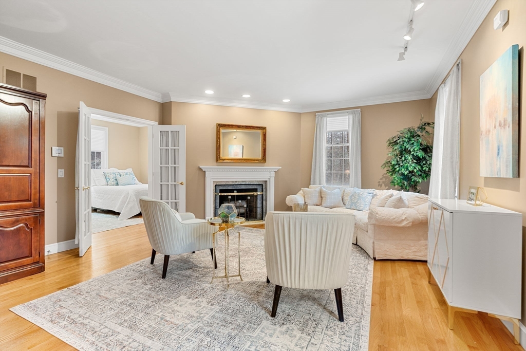 3 Stone Road Boxford, MA 01921 - Photo 8 of 40 a living room with furniture and a fireplace