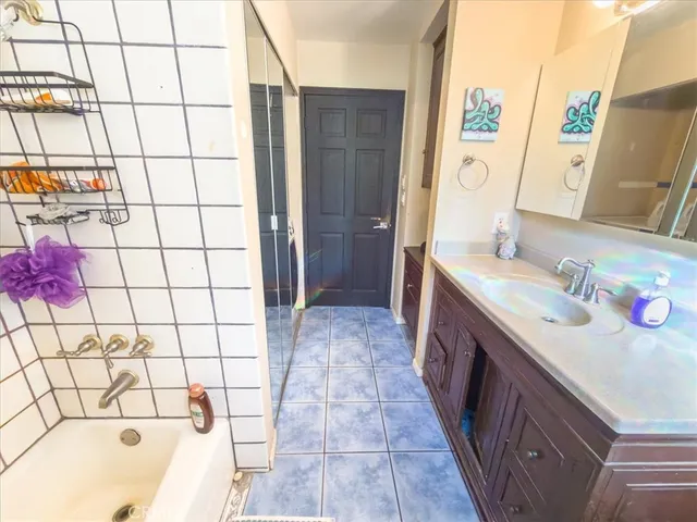 a bathroom with a sink and a bathtub