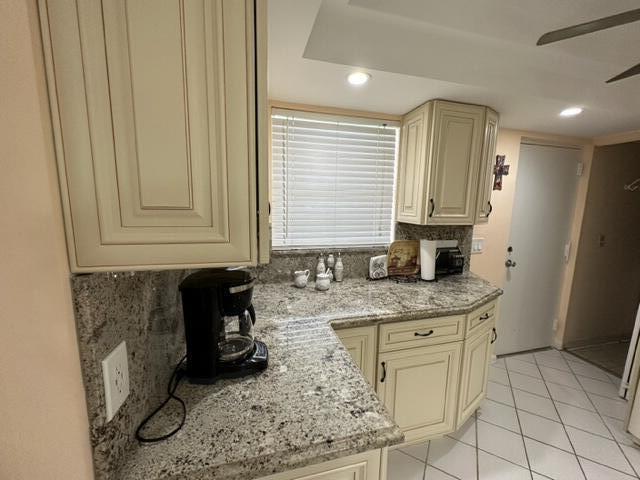 6500 Northwest 2nd Avenue, Unit 512 Boca Raton, FL 33487 - Photo 5 of 41 a kitchen with stainless steel appliances granite countertop a sink stove and cabinets