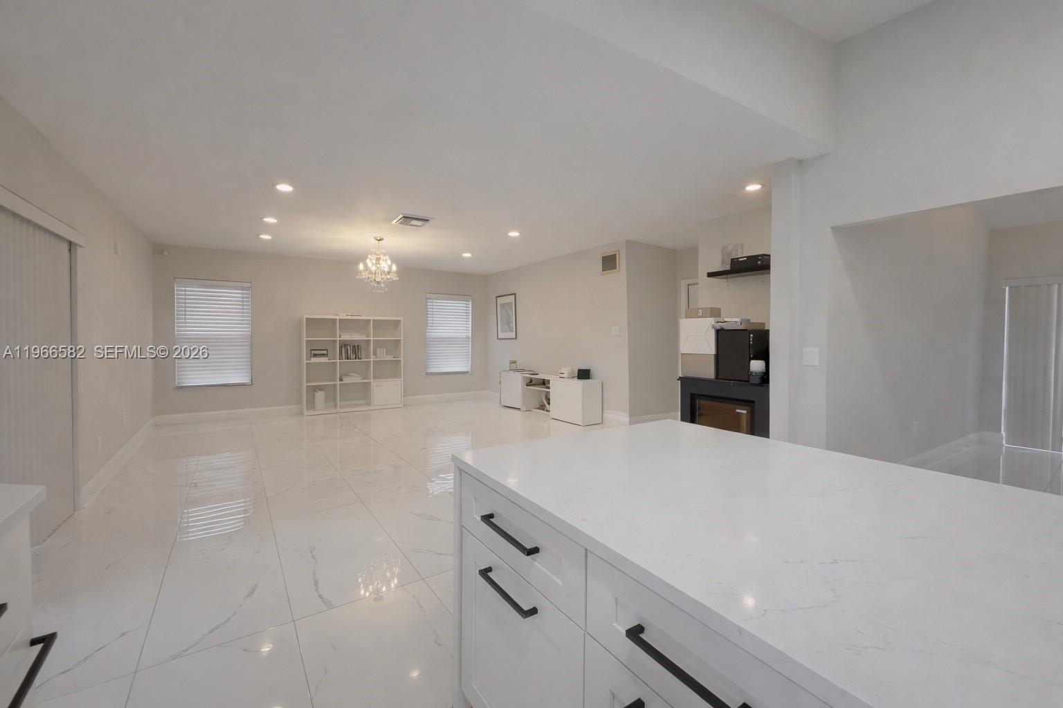 20888 Sugarloaf Lane Boca Raton, FL 33428 - Photo 15 of 25 a view of kitchen with center island and stainless steel appliances