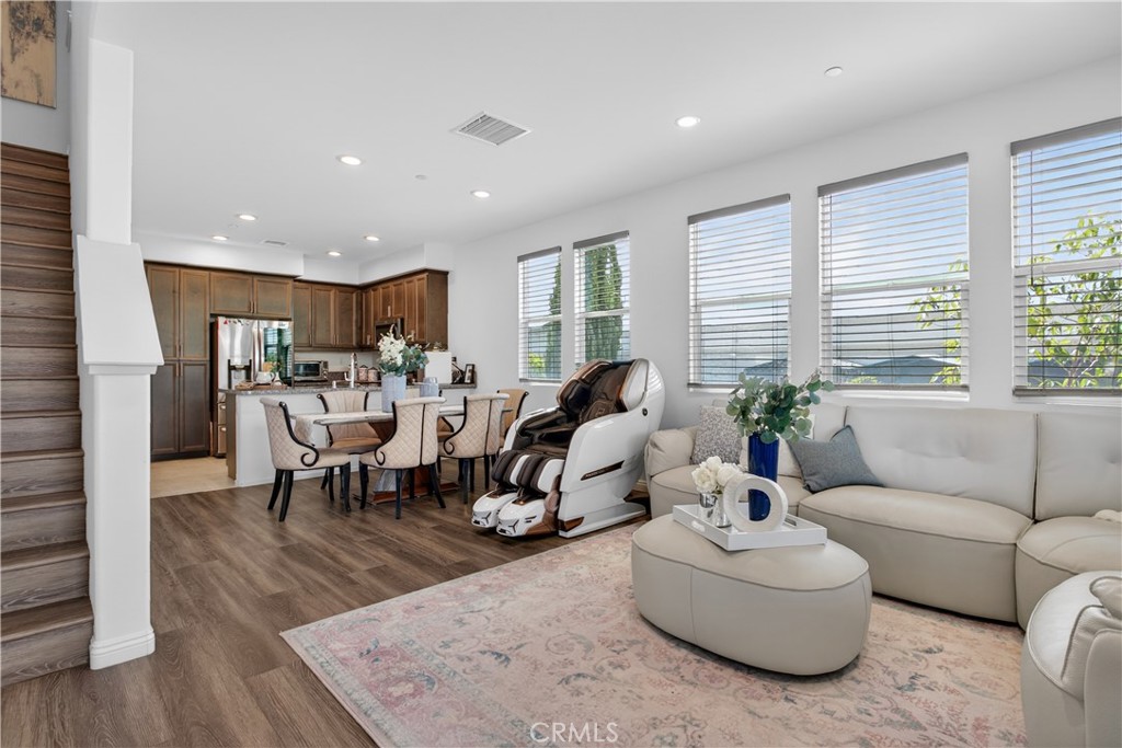 5796 Spring Street Buena Park, CA 90621 - Photo 14 of 33 a living room with furniture kitchen and a table