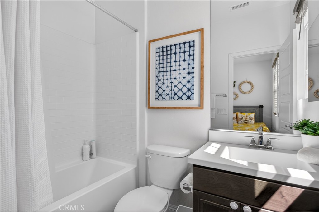 5796 Spring Street Buena Park, CA 90621 - Photo 18 of 33 a bathroom with a sink toilet and bathtub